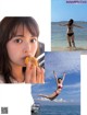 A woman in a bikini eating a donut on the beach.